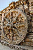 Konarak - Orissa. The Sun Temple, details of the twelve pairs of the great wheels arrayed along the platform. 