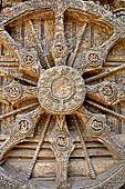 Konarak - Orissa. The Sun Temple, details of the twelve pairs of the great wheels arrayed along the platform. 