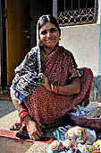 Orissa - Raghurajpur. Selling to tourists. 