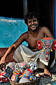 Orissa - Raghurajpur. Selling to tourists. 