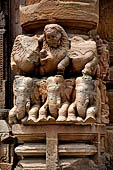Orissa - Bhubaneswar. Rajarani temple, lions at the base of the pillars of the gates of the jagamohana. 
