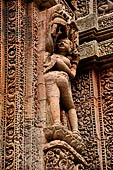 Orissa - Bhubaneswar. Rajarani temple, sculpture of alasa kanya (indolent maiden) in languid and alluring poses. 