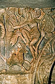 Udaigiri Cave 1  Rani Gumpha Queen's Cave - friezes of the upper storey. The reliefs narrate the story of a Kalinga queen carried away by Ashoka after the Kalinga battle. The forth tableau: the hunt. Detail of the lady looking down from a tree. 