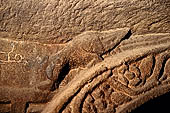 Khandagiri hill, Tatowa Gumpha n.2  the 'Parrot Cave', parrot decorating the side of the doorway.