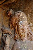 Orissa - Bhubaneswar. Udaigiri, Cave n4, details of the female figure with a parrot of the entrance cell.