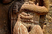 Orissa - Bhubaneswar. Udaigiri, Cave n4, details of the female figure with a parrot of the entrance cell.