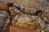 Udaigiri Cave 1 Rani Gumpha Queen's Cave - sculpted capitals of the left wing of the lower storey.