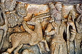 Udaigiri Cave 1 Rani Gumpha Queen's Cave - friezes of the upper storey. The story of a Kalinga queen carried away by Ashoka after the Kalinga battle. Detail of the fourth tableau: the prince shooting at the winged antelope. 
