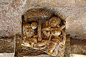 Khandagiri hill, Tatowa Gumpha n.2  the 'Parrot Cave', bracket with a dancer with a musician playing under a tree . 