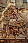 Orissa - Bhubaneswar. Vaital deul, east face of the deul: 'chaitya' medallions with Sun God 'Surya' and above a ten-armed 'nataraja'. 