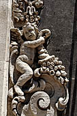 Catania Palazzo Biscari - details of the rich decoration of the windows of the facade.