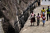 Aluvihara cave temples - The caves temples linked by flights of steps and narrow paths in a jumble of massive rock boulders. 