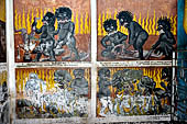Aluvihara cave temples - Cave 2. Paintings of the cave entrance. Wall paintings of the Buddhist hell. 