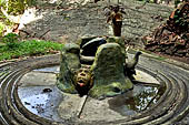 Aluvihara cave temples - At the end of the Horror Chamber a representation of the Mount Meru with the four sacred rivers. 