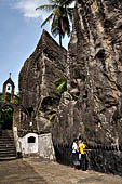 Aluvihara cave temples - The caves temples linked by flights of steps and narrow paths in a jumble of massive rock boulders. 