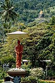 Aluvihara cave temples - Statue of the Indian Buddhist scholar Buddhaghosa. 