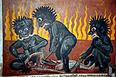 Aluvihara cave temples - Cave 2. Paintings of the cave entrance. Wall paintings of the Buddhist hell. 