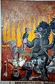 Aluvihara cave temples - Cave 2. Paintings of the cave entrance. Wall paintings of the Buddhist hell. 