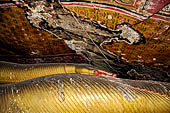 Dambulla cave temples - Cave 3, Maha Alut Viharaya (Great New Temple), detail of the reclining Buddha statue. 