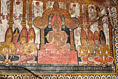 Dambulla cave temples - Cave 3, Maha Alut Viharaya (Great New Temple), paintings of the ceiling show the future Buddha, Maitreya, preaching in a Kandyan-looking pavilion to a group of splendidly adorned gods.