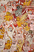 Dambulla  - Cave 2 Maharaja Vihara (Temple of the Great Kings) panels of the Defeat of Mara: Buddha is seated in bhumisparsha mudra (calling earth to witness) whilst demons attack him led by Mara  on elephant. 