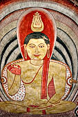 Dambulla cave temples - Cave 2, Maharaja Vihara (Temple of the Great Kings) panels of the Mara Parajaya (Defeat of Mara): the third panel shows the Isipatana: Buddha seated in the vitarka mudra gives the first sermon to an assembly of gods. 