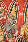 Dambulla cave temples - Cave 2, Maharaja Vihara (Temple of the Great Kings) panels of the Mara Parajaya (Defeat of Mara): panel of the Isipatana, details of the assembly receiving the first Buddha sermon. 