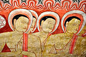 Dambulla cave temples - Cave 2, Maharaja Vihara (Temple of the Great Kings) panels of the Mara Parajaya (Defeat of Mara): panel of the Isipatana, details of the assembly receiving the first Buddha sermon.