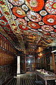 Mulkirigala cave temples - The first cave of the first terrace. Decoration of the roof with flowers.  