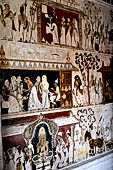 Mulkirigala cave temples - Third terrace. The Raja Mahavihara or the Old Temple. Jathaka stories paintings at the cave entrance.