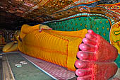Mulkirigala cave temples - Third terrace. The Aluth Viharaya. Reclined Buddha statue.