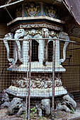 Mulkirigala cave temples - Details of the big oil lamp of the first terrace. 