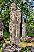 Polonnaruwa - Standing Buddha statue in the centre of the Atadage. 