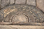Polonnaruwa - the Vatadage. Detail of the moonstone of the western stairway. 