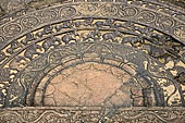 Polonnaruwa - the Vatadage. Detail of the moonstone of the eastern stairway. 