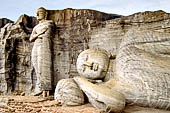 Polonnaruwa - Gal Vihara. The 14m long reclining Buddha in paranirvana mudra, next the 7m standing Buddha in an unusual mudra.  