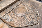 Kandy - The Sacred Tooth Relic Temple, carved stone entrance to the shrine, detail of the moonstone. 