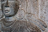 Kandy - The Sacred Tooth Relic Temple, detail of the carved stone entrance to the shrine. 