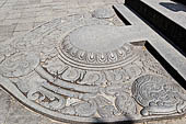 Kandy - The Sacred Tooth Relic Temple, the Great Gate detail of the triangular moonstone. 