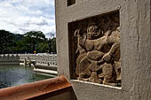 Kandy - The Sacred Tooth Relic Temple, stone carving of the 'Great Gate'.  