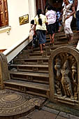 Kandy - The Sacred Tooth Relic Temple, guardstones of the stairway leading to the New Shrine Room. 