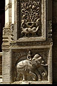 Kandy - The Sacred Tooth Relic Temple, the New Shrine Room. Details of the stone decorations of the external entrance. 