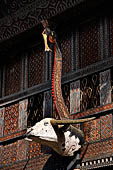 Ke'te Kesu - Traditional tongkonan house. The mysterious so-called katik on top of the buffalo head a big, long-necked bird with a crest
