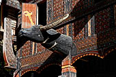 Pallawa - Traditional tongkonan house. The front of the house usually has a carved buffalo head and a collection of genuine buffalo horns.