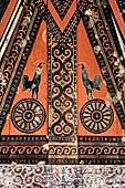 Pallawa - Traditional tongkonan house. The exterior walls are covered with wood panels etched with geometric patterns and painted with black and red colours.  