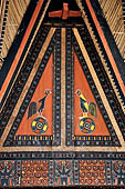 Pallawa - Traditional tongkonan house. The exterior walls are covered with wood panels etched with geometric patterns and painted with black and red colours.  